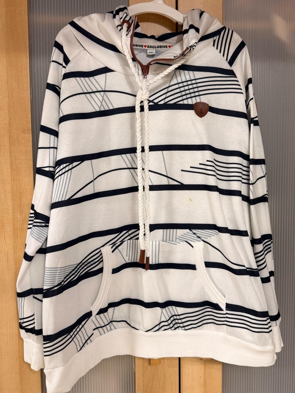 Cream and Navy Striped Hoodie with Leather Logo Patch. *** small stain see pic